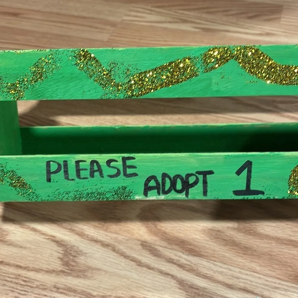 Wooden shelf to hold “animals” for adoption- party favors